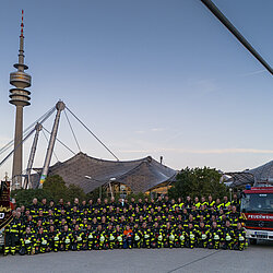 Mannschaftsfoto der Freiwilligen Feuerwehr Muenchen - Abteilung Stadtmitte, aufgenommen am 06. August 2024 in München.