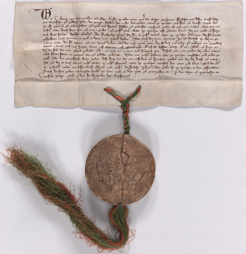 Alte handgeschriebene Brandschutzverordnung mit großem, rundem Siegel, das an einem geflochtener Kordel hängt